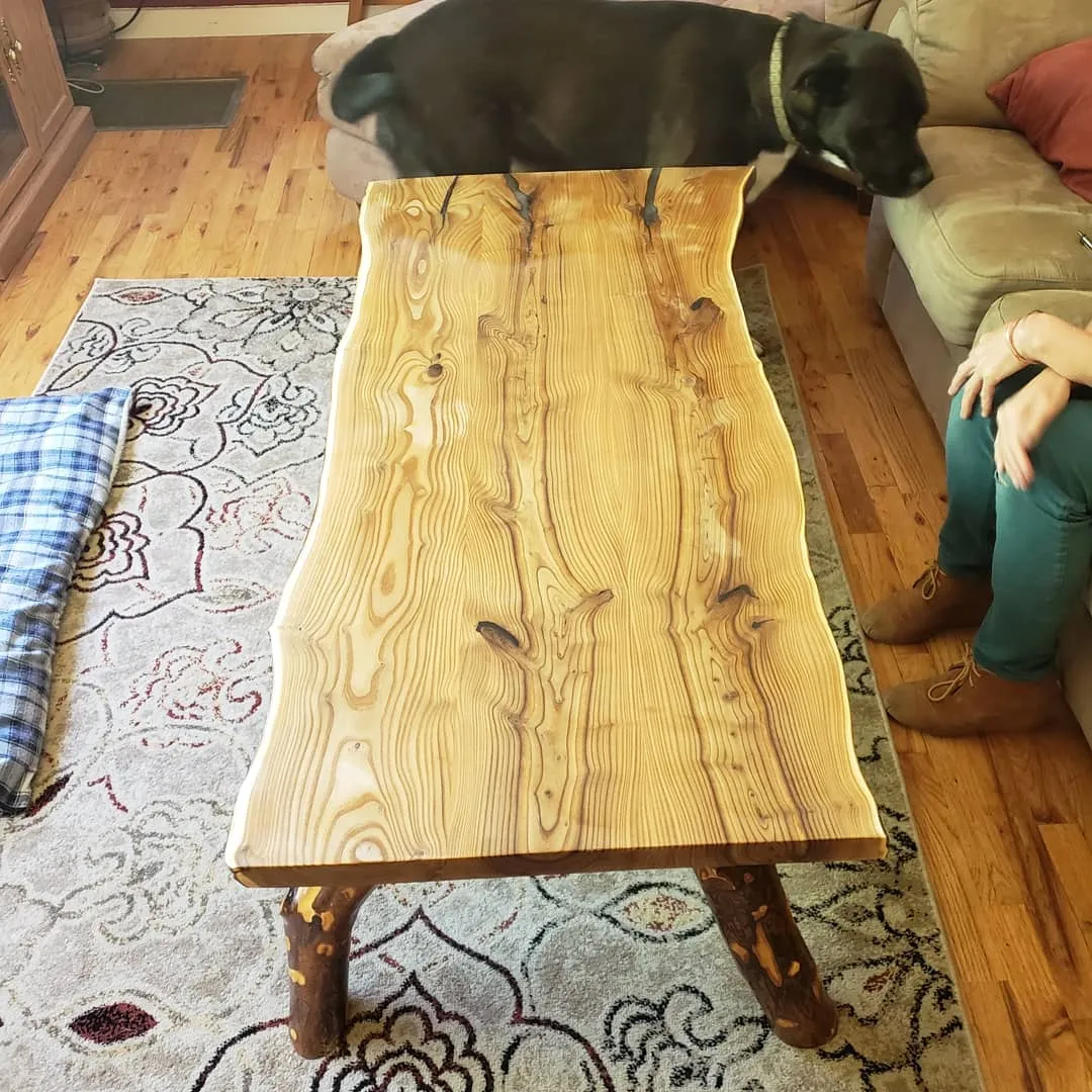 Custom wood slab furniture piece being crafted in workshop